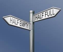 Negative thinking - street signs half empty and full