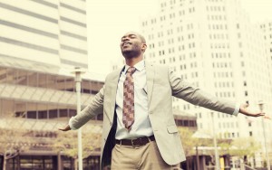 african american business man enjoying deep breath outside