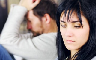 Toxic Relationships and Addiction, Toxic Relationships in Addiction Recovery, distraught man sitting next to ambivalent woman