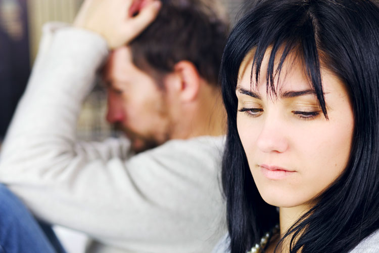 Toxic Relationships and Addiction, Toxic Relationships in Addiction Recovery, distraught man sitting next to ambivalent woman