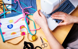 Coping with Stress in Addiction Recovery, woman sewing homemade masks on sewing machine - stress