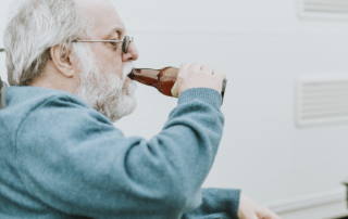 older man with bottle - drinking