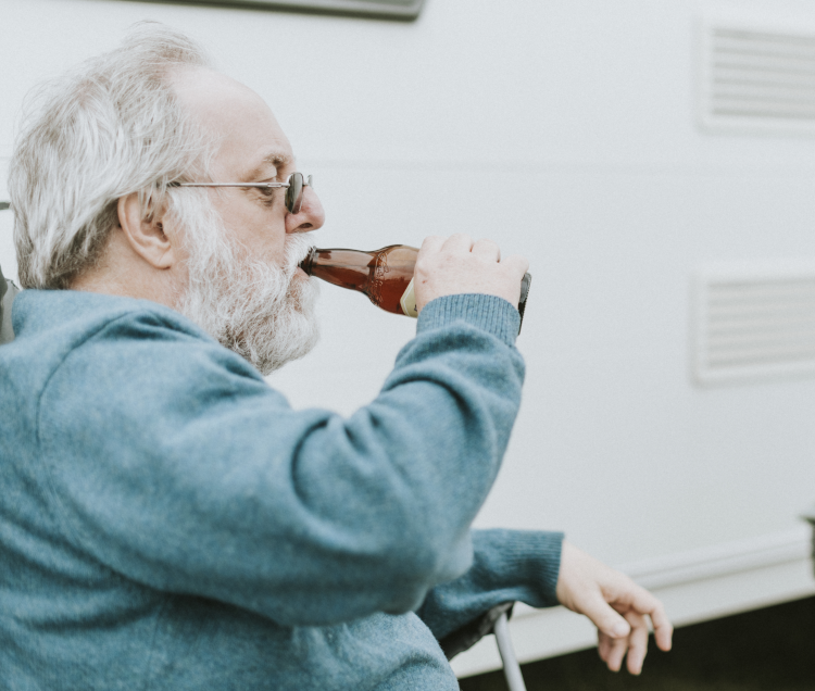 older man with bottle - drinking