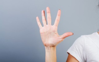 cropped shot of a feminine hand held out to represent the number five - substance use disorder