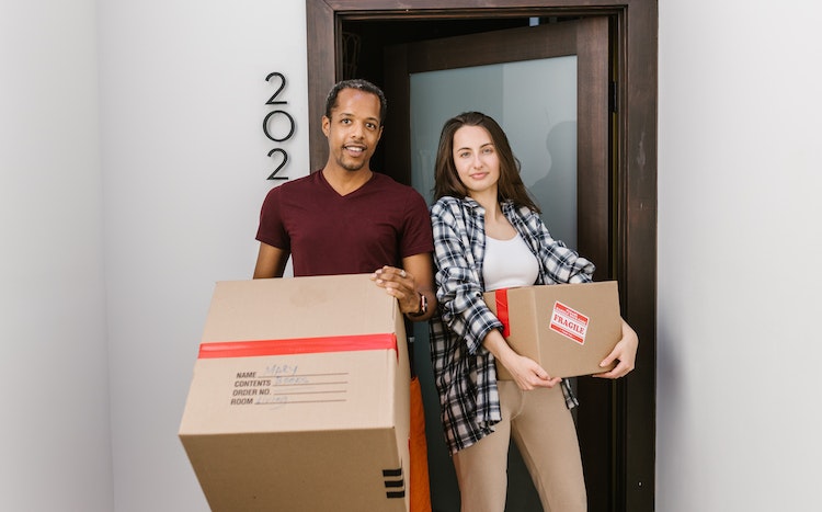 couple moving boxes addiction treatment center