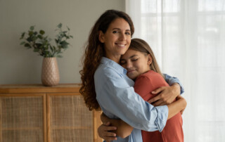 mother and daughter hugging