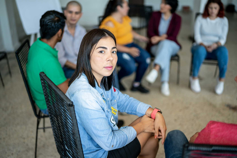 support group of diverse young adults - group therapy - addiction treatment - mental health treatment